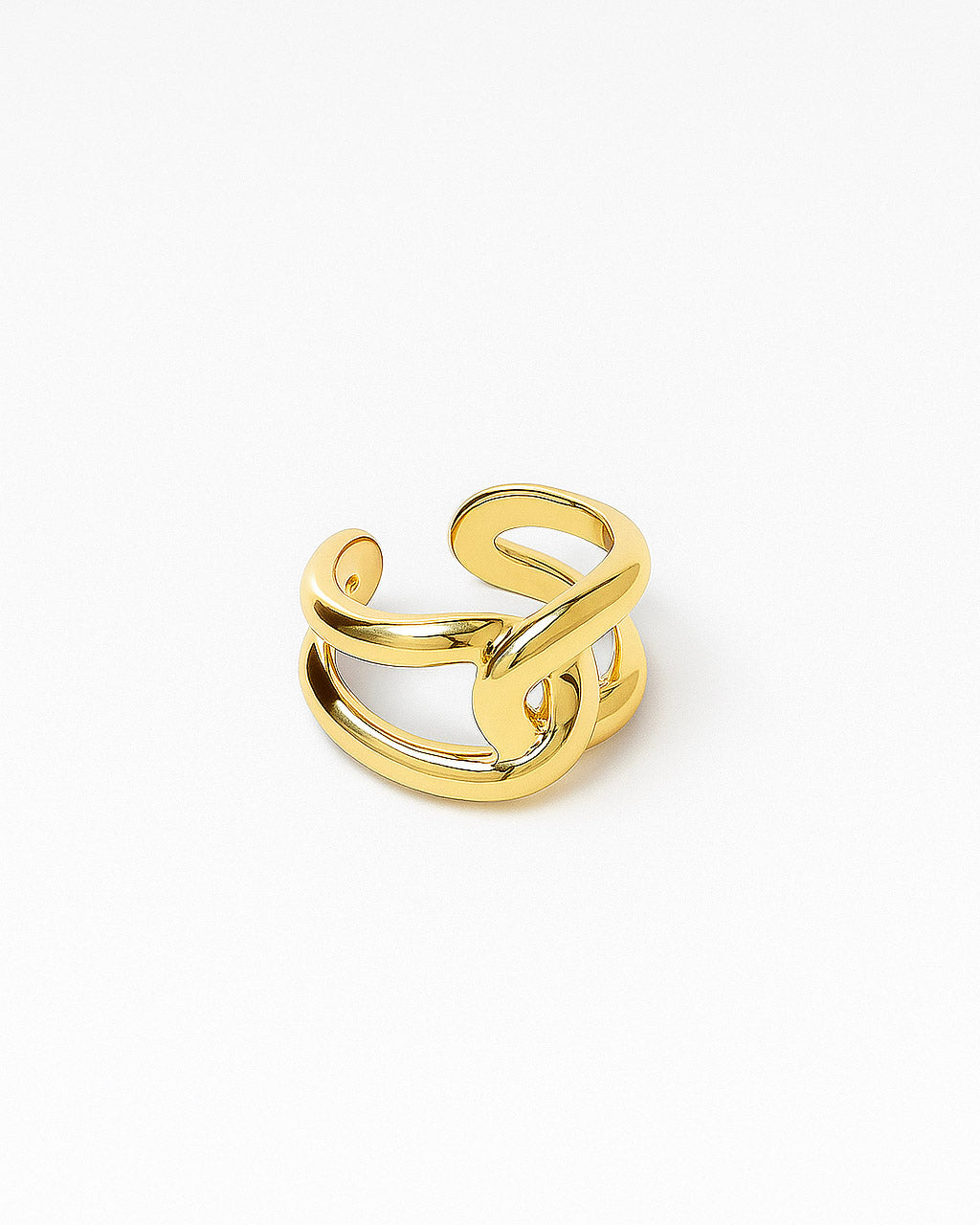 Minimalist bold gold dome ring on white background
