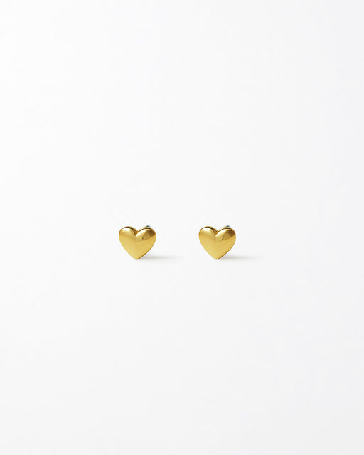 Two gold heart-shaped earrings on a white background