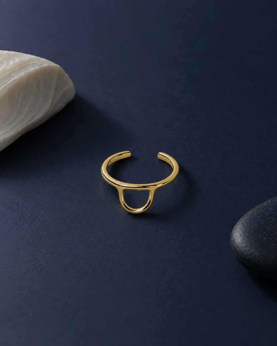 CLEO gold open ring with sculptural loop detail