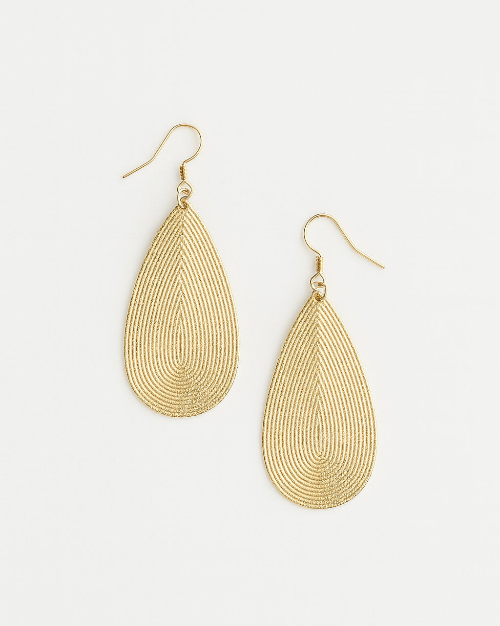 Ellie gold teardrop earrings 16K gold-plated brass on white background